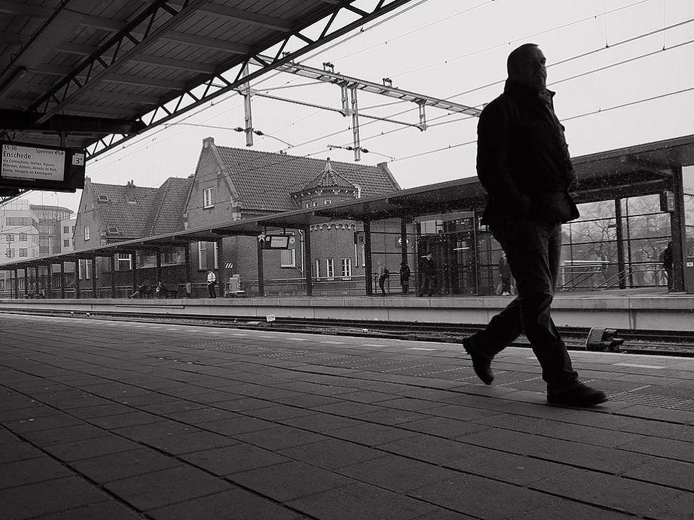 Young Man Train Station Stock Photo