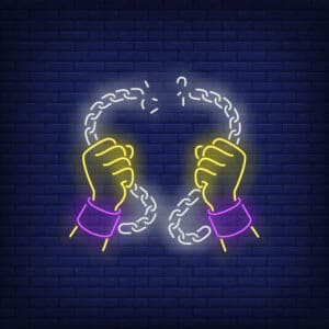 Neon image of hands breaking a chain.